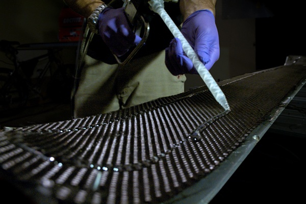 Joel applies epoxy to carbon sub-layer