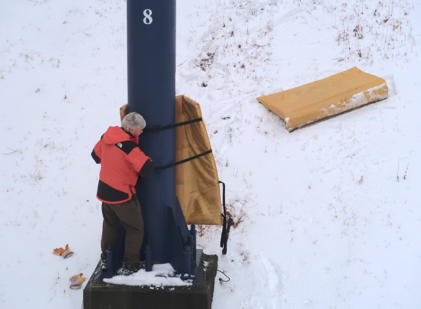Installing ski lift tower pads